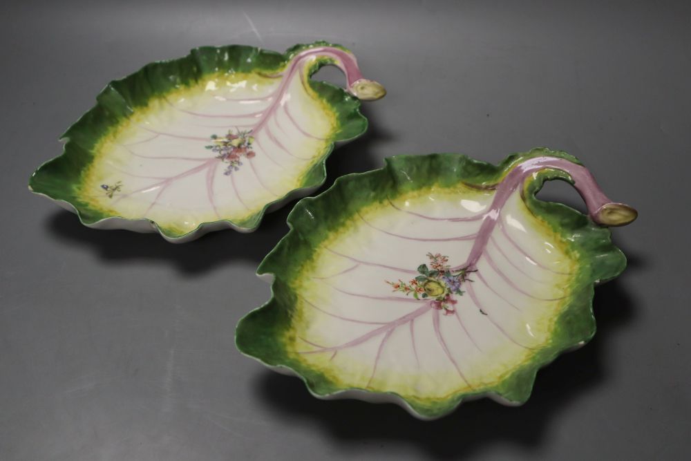 A pair of Chelsea red anchor period leaf shaped dishes, c.1755, one only with red anchor mark, 24cm (both a.f.)